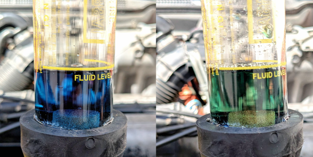 Result of a head gasket test kit showing the fluid color change from blue to green.