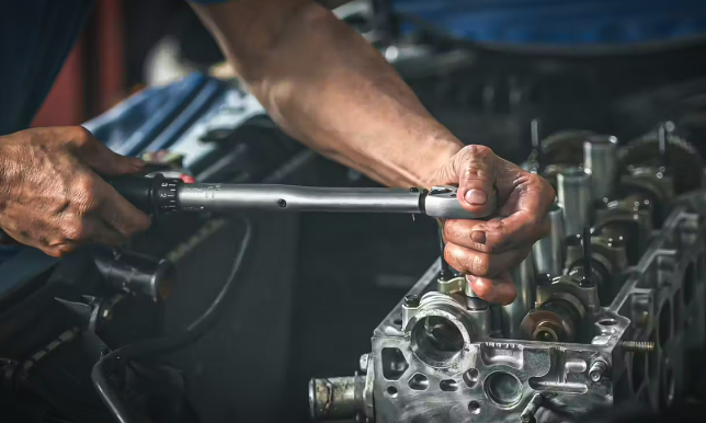 Following cylinder head bolt torque specs during engine assembly.