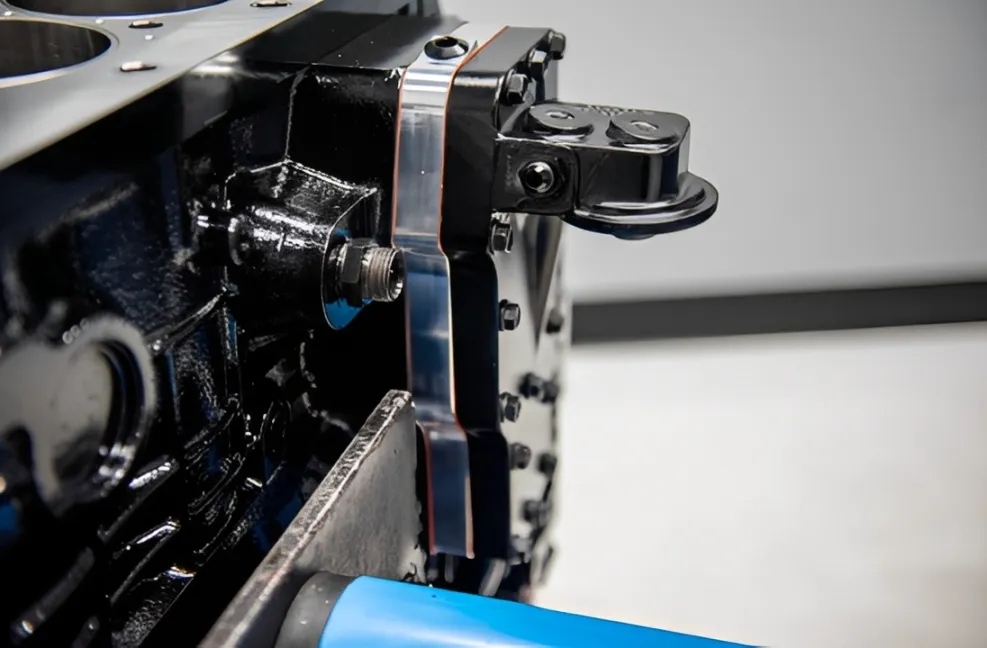 OEM 12 valve Cummins oil cooler assembly mounted on engine block