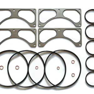 Unpacked 4011507 oil cooler seal kit components including metal gaskets and FKM O-rings