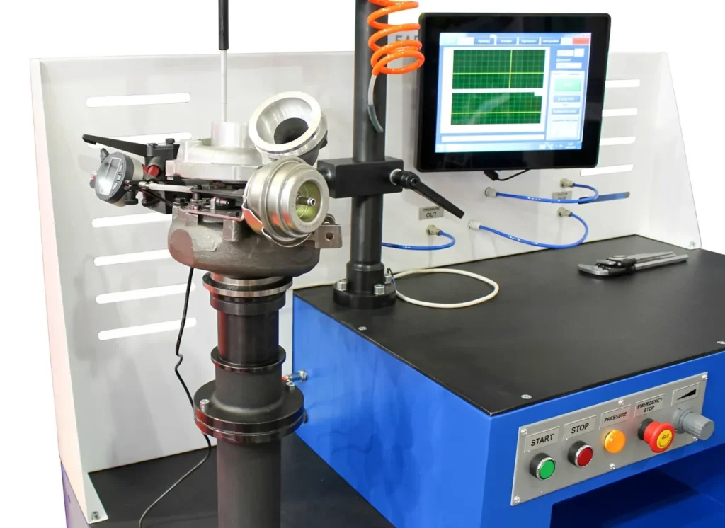 mechanic inspecting vehicle turbocharger linkage arm