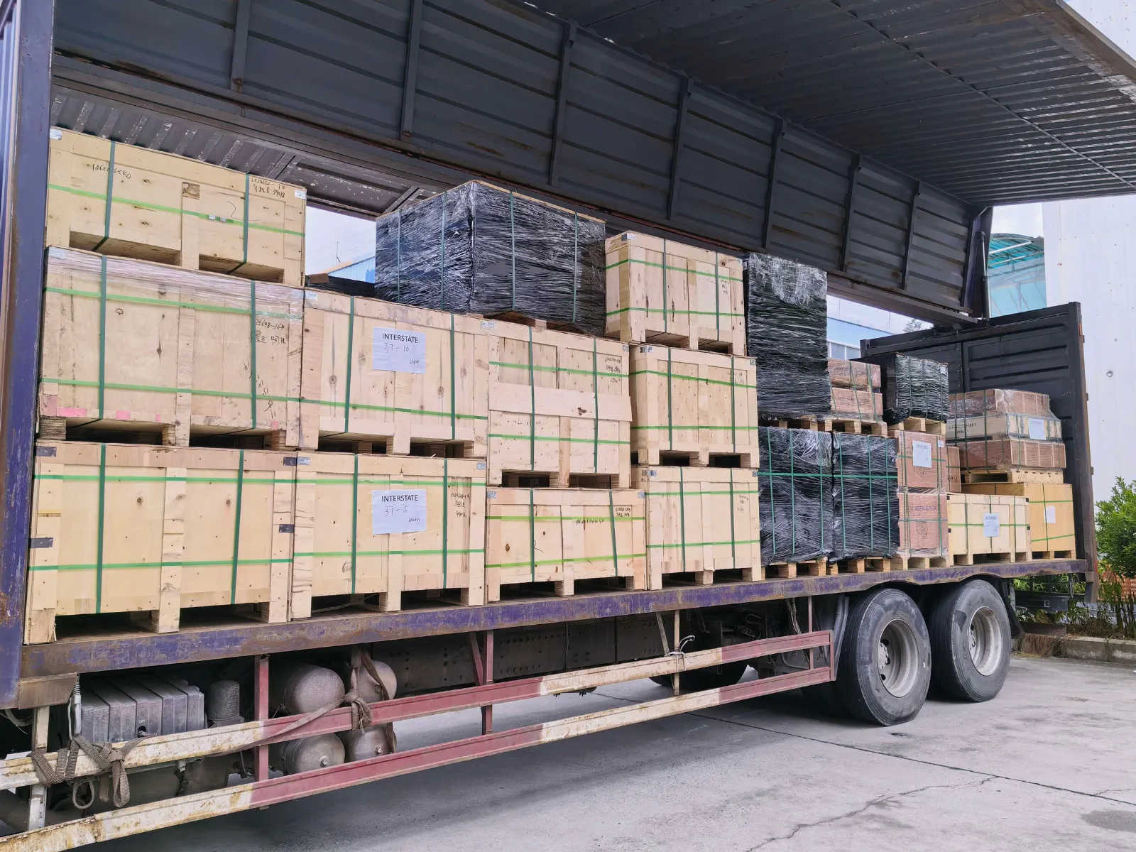 Wooden crates and wrapped cargo for the 37-item Uruguay shipment