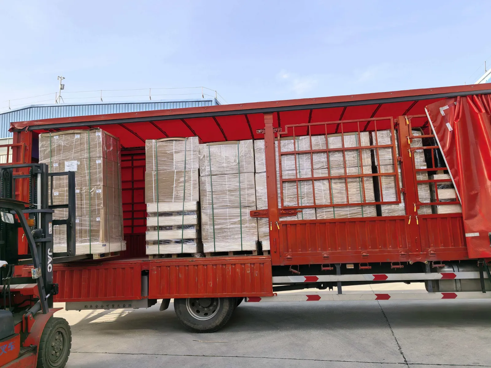 Forklift loading cargo for the 19-item Russia shipment