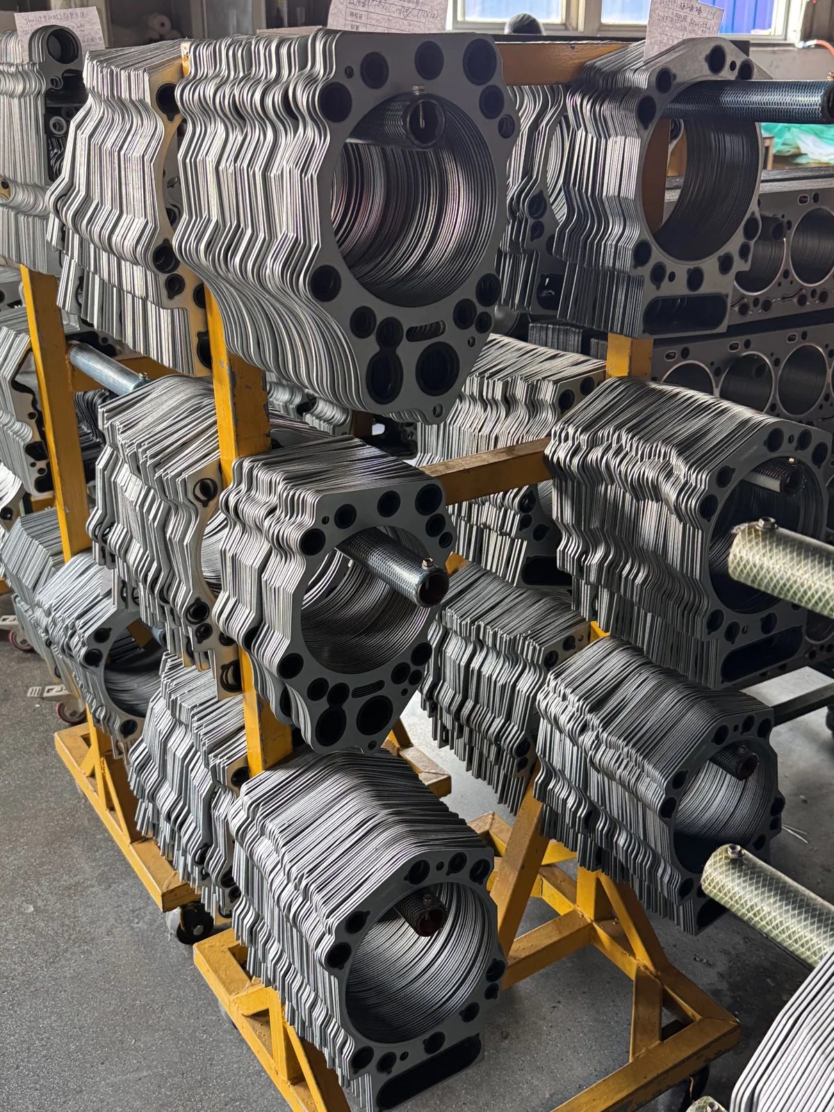 Gasket products on yellow workshop racks