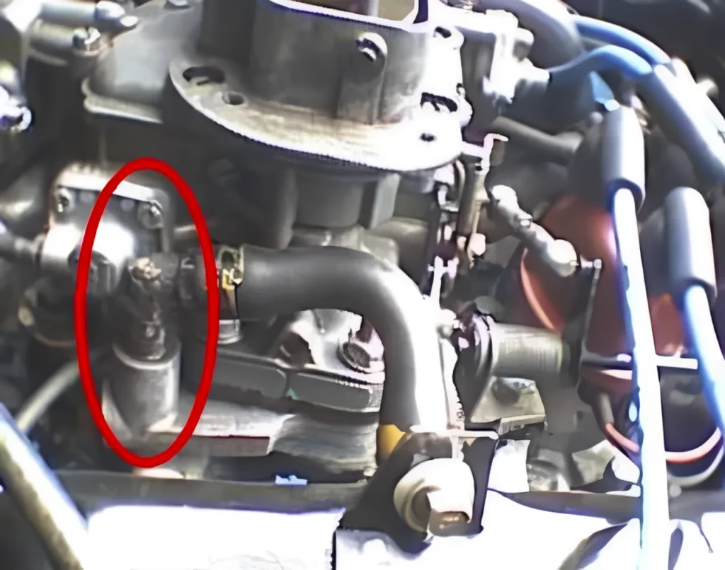 Diesel engine valve cover and crankcase ventilation connection.